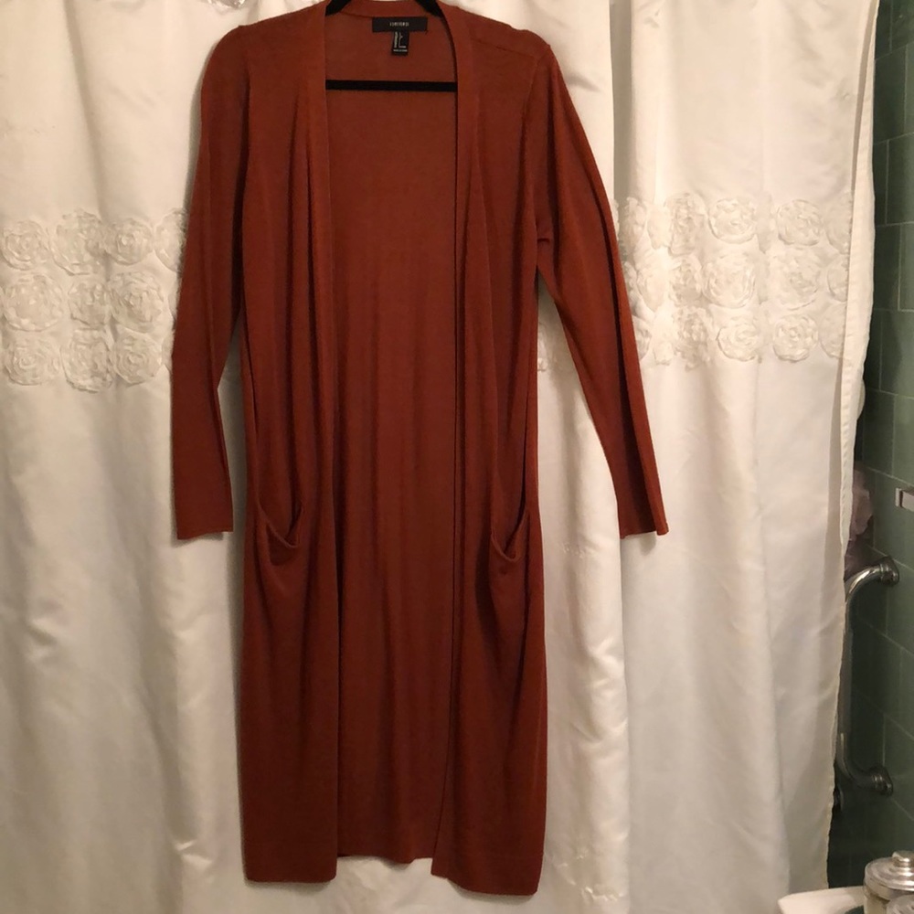Forever 21 long sweater size Large. Burnt orange colour.